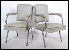 A pair of retro French mid century chrome and vinyl cantilever salon - dining chairs. Cantilever