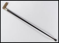 A 19th century Victorian walking stick cane having a tapering ebony shaft with silver hallmarked