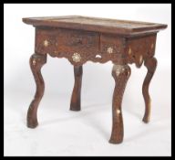 A 19th Century carved hardwood inlaid stool believed to be of Moorish / Persian origin, ornately