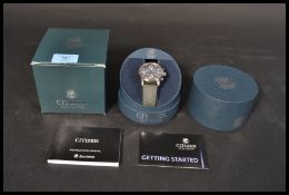 A boxed gents Citizen Eco-Drive WR100 stainless steel black dial  chronograph watch, comes with