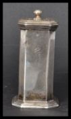 A silver hallmarked Mappin and Webb pepper pot pepperette condiment of octagonal form raised on a