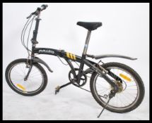 A fantastic Pyramid folding bike / bicycle fitted with Shimano gears and both tyres holding air.