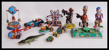 CLOCKWORK WIND UP TIN TOYS