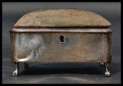 An early 20th century silver hallmarked box with pin cushion atop lid by George Nathan & Ridley