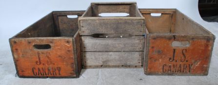 A group of three vintage 20th century wooden shipping crates with notation to sides. Please see