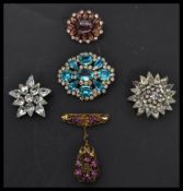 A group of early 20th century costume dress jewellery brooches to include Rhinestone 3d layered
