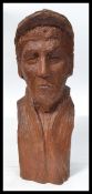 A 1970's retro wooden carved bust study being hand carved by Simon Hedgewell. Confirmed by artist as
