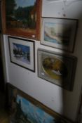 A collection of various oil paintings of landscapes and scenic views all in ornate gilt frames.