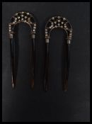 A pair of early 20th century tortoiseshell and rhinestone set hair slides having folding ends.