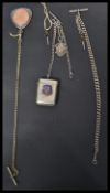 A hallmarked silver pocket watch Albert chain with pocket watch key along with another silver