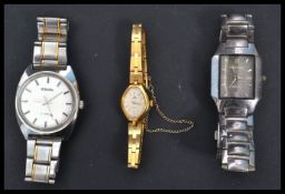 A group of three vintage 20th century watches to include a Chicks 17 jewel stainless steel watch ,
