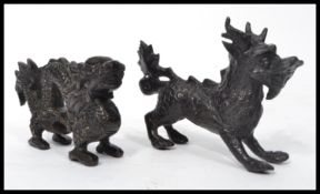 Two 19th / 20th century bronze Chinese mythical creatures to include a dragon and kylin. Detailed