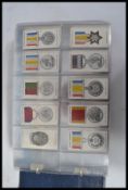 An album of vintage cigarette cards mainly full sets to include Players decorations and medals never
