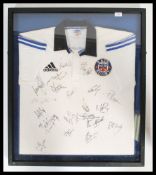 A framed and glazed Bath Rugby shirt from the 2000