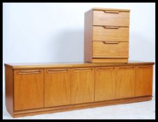 A retro vintage 20th Century Danish inspired low sideboard teak wood on plinth base together with