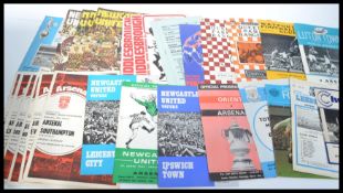 A collection of vintage and retro Football League and FA Cup football programmes dating from the
