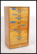 A vintage 20th Century ten drawer wooden specimen / filing / engineers cabinet, brass drawer