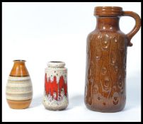 A group of three vintage 20th century West German ceramic vases to include fat lava and peacock