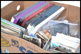 Large quantity of stamps, postcards and photos etc in banana box.