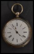 A vintage early 20th century silver white metal pocket watch having a white enamel face with roman