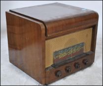 A vintage 20th century walnut cased Sorbell valve radiogram, having a later fitted four speed record