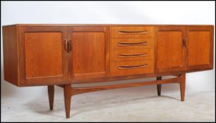 A G-plan vintage 20th century retro teak 'Fresco' sideboard with four central drawers flanked by