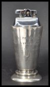A 20th century Garrard & Co silver lighter hallmarked London 1962. Ronson lighter to top.