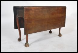 A George II / George III 18th Century heavy mahogany drop-leaf gate leg dining table,  serpentine