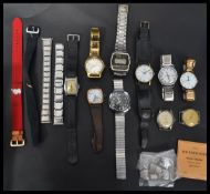 A collection of vintage and retro 20th Century gents wrist watches to include Pierce, Paramount,