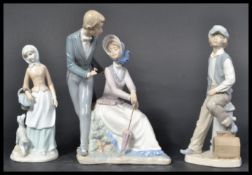 A collection of 2 Nao figurines to include gentlem