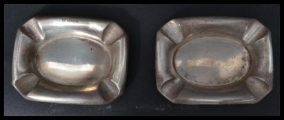 A pair of silver hallmarked four person ashtrays / ash trays by J B Chatterley & Sons Ltd.
