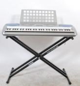 A good Yamaha keyboard complete with stand, carry bag and power leads. In working order.