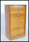 A vintage 20th Century eleven drawer wooden specimen / filing / engineers cabinet, brass drawer