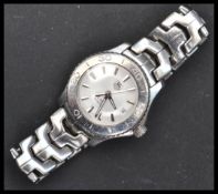 A Tag Heuer Link 200 meter stainless steel watch , the silvered dial having baton numerals with