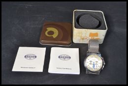 A cased Fossil gents wrist watch, silvered dial with three subsidiary dials fitted on a steel