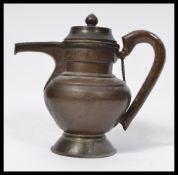 An unusual believed 19th century bronze teapot / tea pot of Islamic origin. The teapot with