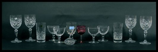 A 19th Century hand blown wine rummer raised on a pedestal base together with a collection of cut