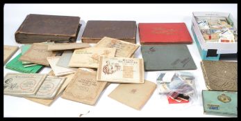 A good collection of vintage 20th Century cigarette cards to include several in albums and loose