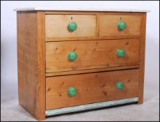 A vintage early 20th Century country pine chest of drawers, two short drawers over two long, painted