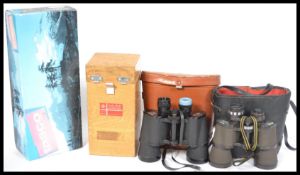 A cased Tasco 28TZB spotting scope with tripod together with a cased Saura HB-65 Hand Bearing