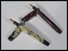 A vintage 20th Century Conway Stewart fountain / Ink pen, fitted with a 14ct gold nib together