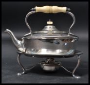 A Victorian Mappin Brothers silver plated spirit kettle picnic tea pot raised on cabroille legs