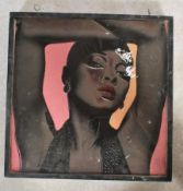 A 20th century unusual hanging light box with acryllic facia of singer, possibly skunk anansie being