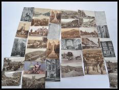 A collection of postcards to include British and overseas. Inc mutiples of Malvern, Devizes,