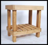 Butchers block - A rustic constructed butchers block of good size, heavy blocked top raised on lower
