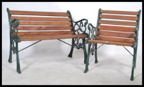 A very heavy 20th century cast metal garden bench and matching chair, recently having new wooden