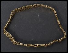 A 9ct gold Italian designer bracelet chain having a claw and ring clasp. Weighs 9.5 grams.