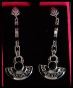 A pair of sterling silver Art Deco style drop earrings set with onyx marcasites and mother of