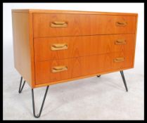 G-Plan - A retro 20th Century teak wood straight three chest of G-Plan drawers raised on hair pin