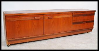 A vintage / retro 20th Century G-Plan low teak wood sideboard, two drawers alongside cupboard